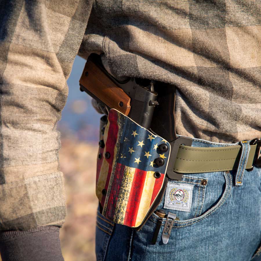 Person wearing an outlaw owb(outside the waistband)