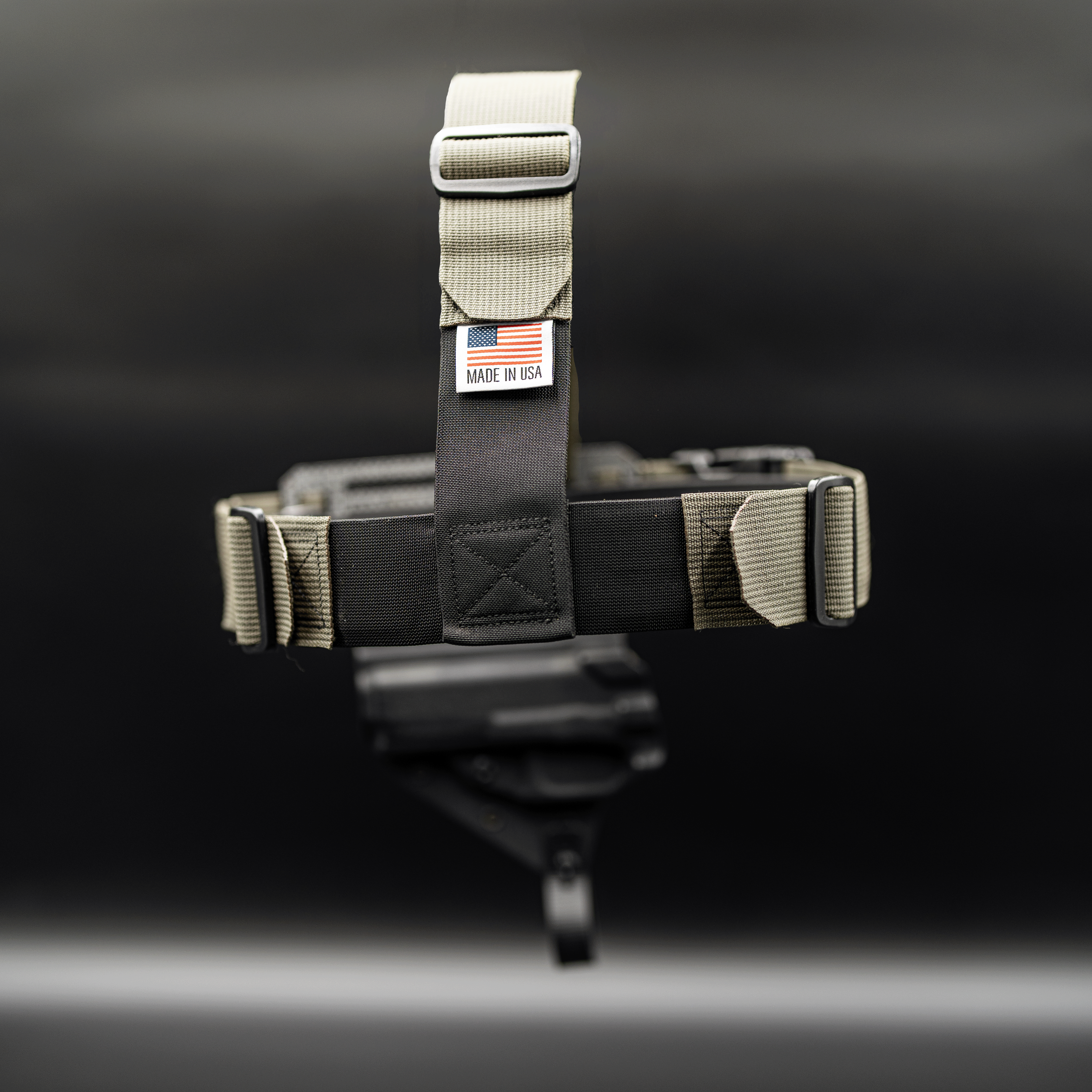 Guide torso harness with 'Made in USA' label on a dark background
