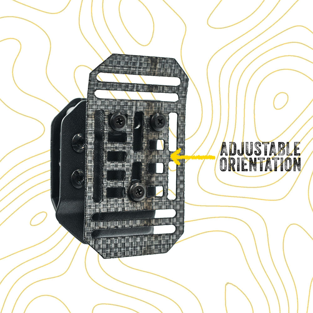 Black adjustable orientation mag carrier with text on a white background