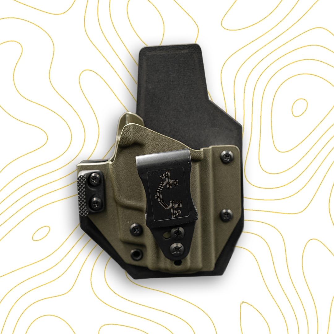 Green and black outlaw IWB(inside the waistband) invader concepts holster with a visible brand logo on a white background with yellow line patterns