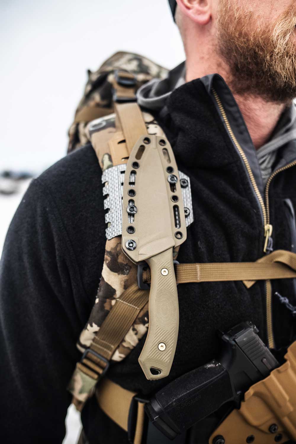 Hunting pack strap knife mount